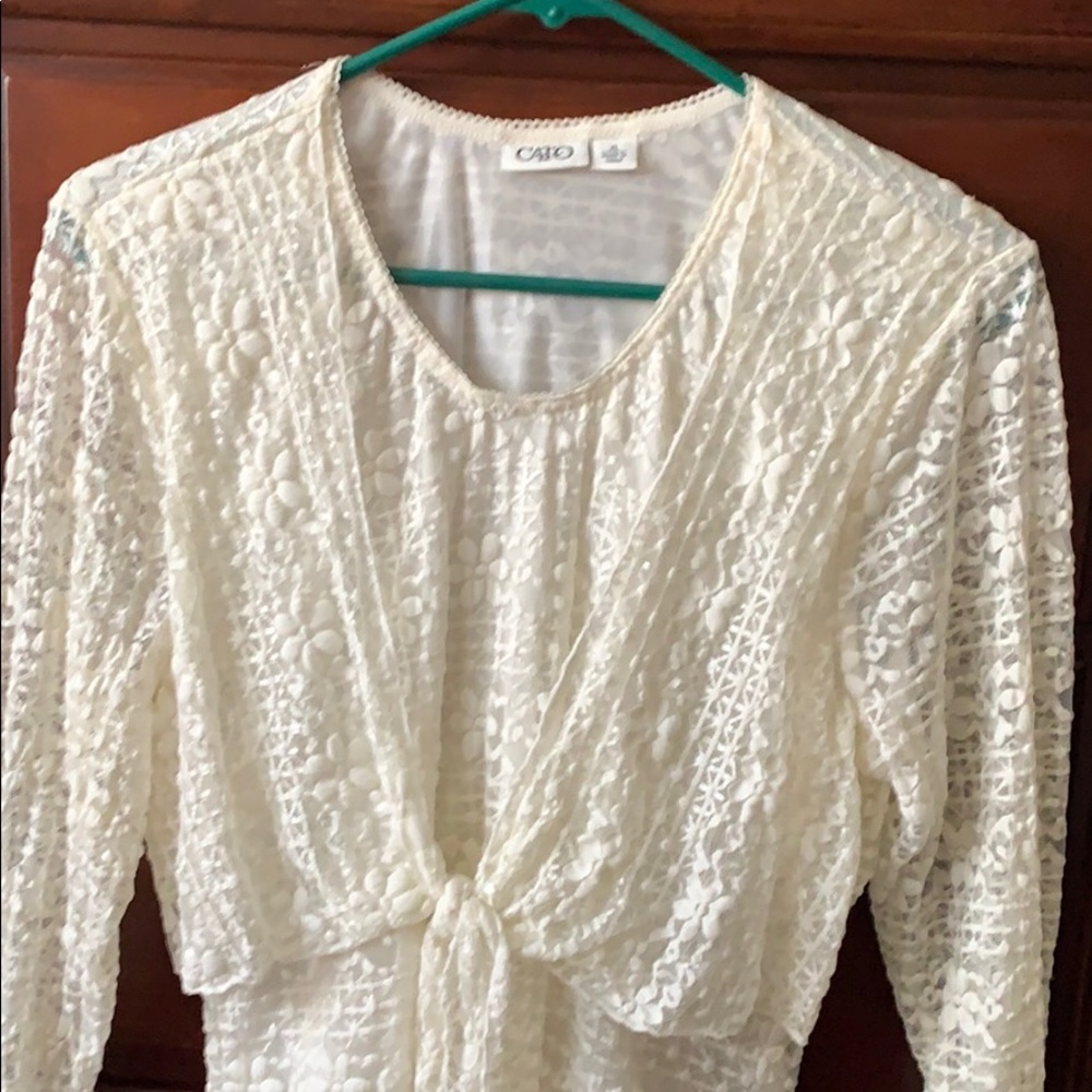 A top very Lacey has long sleeves.